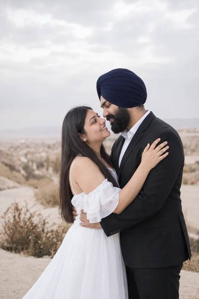 Almost a kiss: a couple photographed at Fairy-chimney valley, Turkey