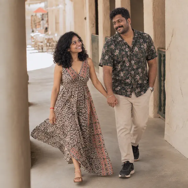 Leading him through Al Seef: a couple photographed at Al Seef, Dubai