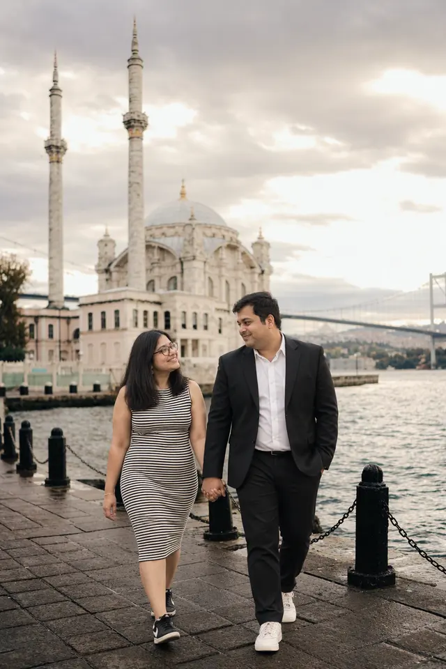A walk by the Bosphorus: a couple photographed at Bosphorus shore, Turkey