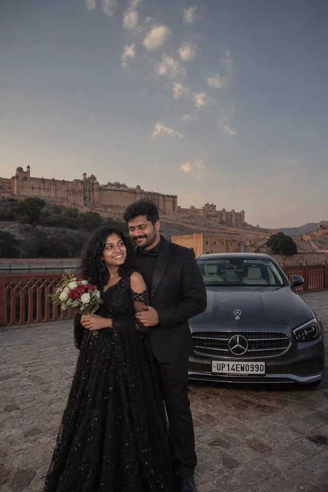 Bouquet by the car: a couple photographed at Amer Fort, Jaipur