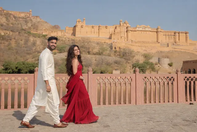 Walking below Amer: a couple photographed at Amer Fort, Jaipur