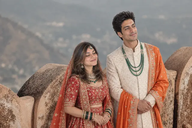 On Jaigarh's walls: a couple photographed at Jaigarh Fort, Jaipur