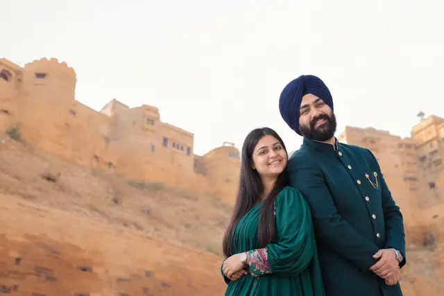 Back to back: a couple photographed at Jaisalmer Fort, Jaisalmer