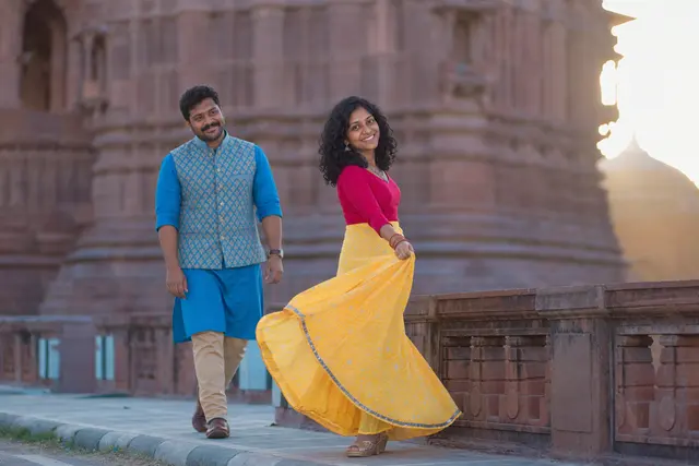 Twirl by the cenotaphs: a couple photographed at Mandore Gardens, Jodhpur